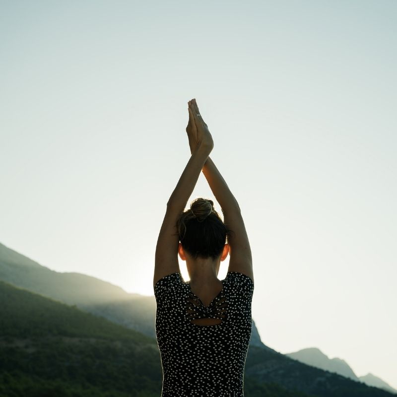 women doing yoga outside