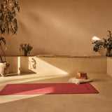 Desert Rose EverGrip Yoga Mat in empty room